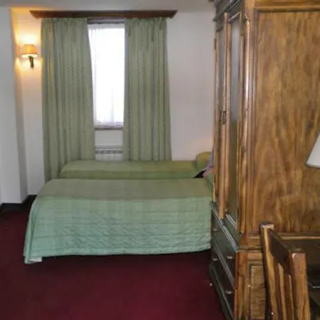 Tavernier Курмайор